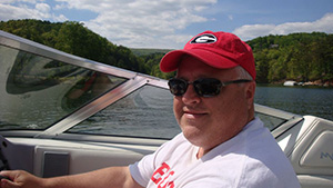 photo of man in boat