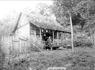 Home and family of John Owl, Oconaluftee Cherokee, Swain County, c. 1900. N.53.3.44 From the General Negative Collection, State Archives of North Carolina                                                                                                                                                                                                                                                                                                 