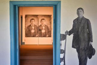 Juan Carson, an enslaved Navajo youth (center) and Gabriel Woodson, an enslaved Navajo person in the San Luis Valley, circa 1880 (right; image courtesy Saguache County Museum). From Unsilenced: Indigenous Enslavement in Southern Colorado at the Fort Garland Museum and Cultural Center (June 2021–ongoing). Image: History Colorado