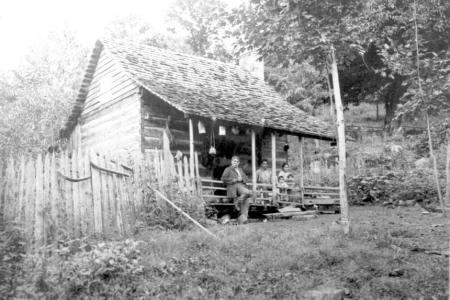 Home and family of John Owl, Oconaluftee Cherokee, Swain County, c. 1900. N.53.3.44 From the General Negative Collection, State Archives of North Carolina                                                                                                                                                                                                                                                                                                 