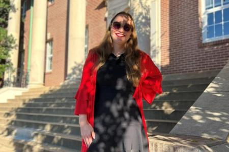 Doctoral candidate Theodora Light in front of UGA's LeConte Hall