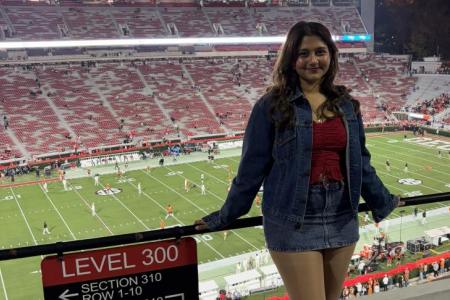Priya Storey pictured on the bridge above Sanford Stadium, UGA