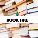 image of many books and book sale sign