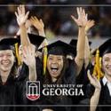 cheering UGA graduates in cap and gown